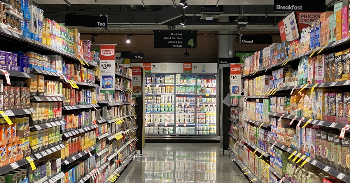 Inside a modern boutique grocery store with fresh produce displays